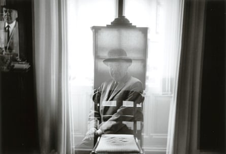 Double-exposure black and white image of the artist Magritte and his easel in 1965.