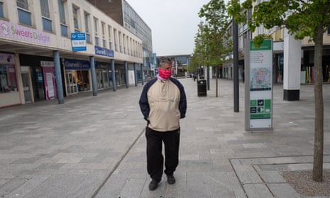 A lone shopper in Crawley, West Sussex, where thousands of jobs are feared to be at risk due to coronavirus.