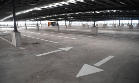An empty car park is seen at the Brisbane international airport, Monday, March 30, 2020. The Australian Government has announced even tighter restrictions around social gatherings, and boosted stimulus spending, in attempts to fight off the coronavirus and its effects on the economy. (AAP Image/Dan Peled) NO ARCHIVING