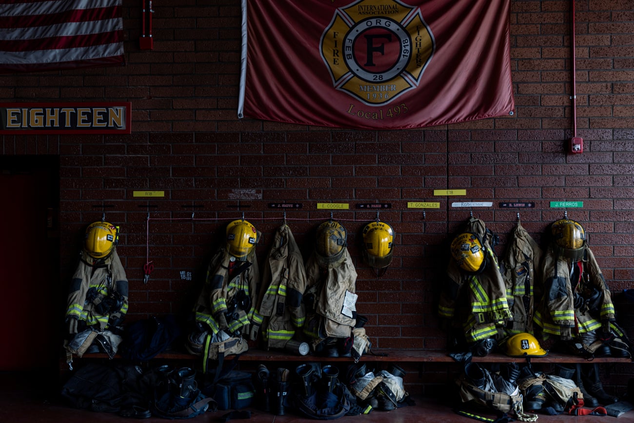 Firefighting PPE hung up in a firehouse