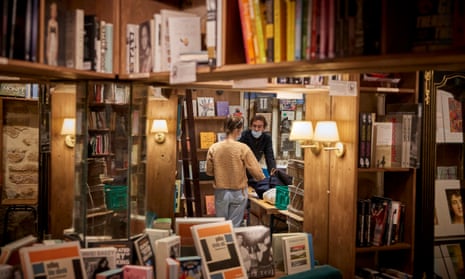 Staff work inside Shakespeare and Company Bookshop in Paris.