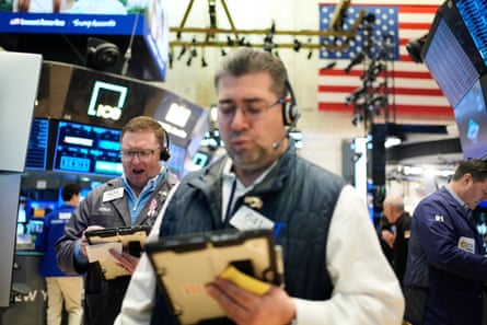 Traders on the floor of the New York Stock Exchange