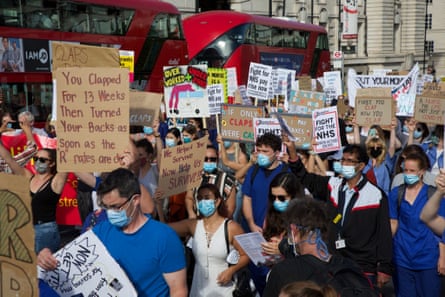 Nurses protest in central London holding signs, with one that reads: ‘You clapped for 13 weeks then turned your backs’