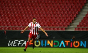 Youssef El Arabi celebrates after scoring for Olympiacos against Wolves in the Europa League in March.