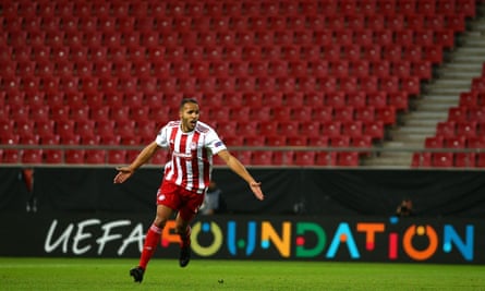 Youssef El Arabi celebrates after scoring for Olympiacos against Wolves in the Europa League in March.