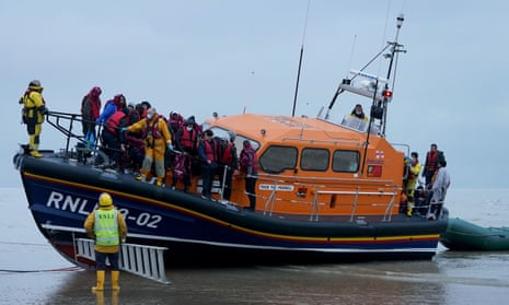A group of people brought in to Dungeness, Kent by the RNLI following a small boat incident in the Channel.