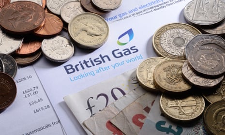 British Gas energy bill with coins and money