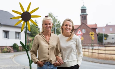 Pernille Harder (L) and girlfriend Magdalena Eriksson pose for a photograph.