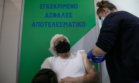 A man receives the Covid-19 vaccine in Athens, Greece.