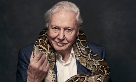 David Attenborough with a snake