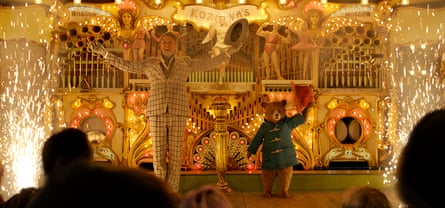 Hugh Grant and Paddington voiced by Ben Whishaw in Paddington 2.