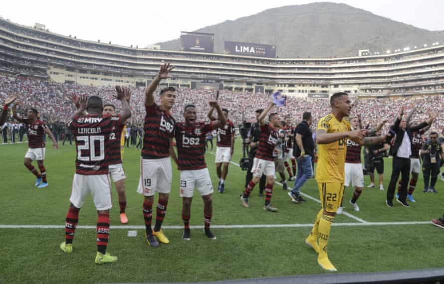 Players of Brazil’s Flamengo celebrate after they defeated Argentina’s River Plate 2-1 to win the the Copa Libertadores final.