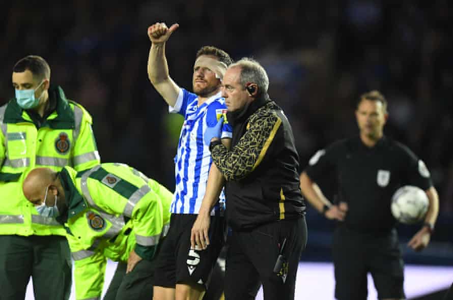 Sam Hutchinson of Sheffield Wednesday gives a thumbs up as he leaves the field.