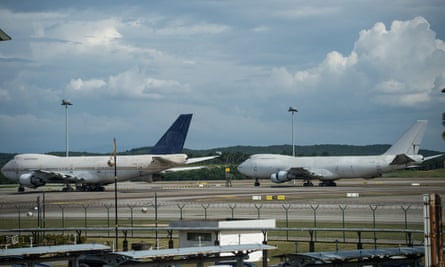 Unclaimed Boeing 747s with registration numbers as TF-ARM (L) and TF-ARN (R) at Kuala Lumpur international airport.