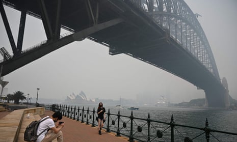 The Sydney Harbour Bridge enveloped in haze caused by nearby bushfires