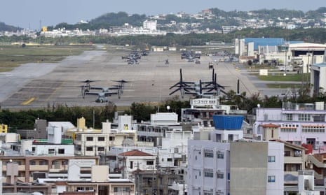 Osprey aircraft at the US Futenma military base in a crowded urban area of Ginowan, Okinawa.