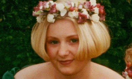 Becky Godden with blonde bobbed hair and a flower coronet