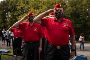 Members of the Marine Corps League Cpl Kevin J Reinhard Detachment 189 salute during the protest at the New Jersey Veterans Memorial Home.