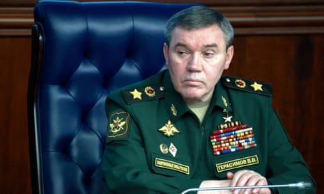Valery Gerasimov wearing uniform and sitting in a high-backed chair