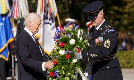 Joe Biden takes part in a wreath laying ceremony at the Tomb of the Unknown Soldier.