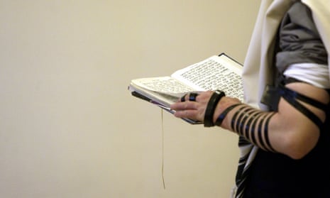 An orthodox Jew prays.
