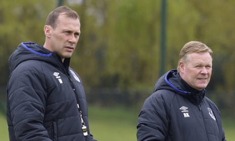 Everton’s manager Ronald Koeman, right and the assistant coach Duncan Ferguson keep an eye on their players during training at Finch Farm.