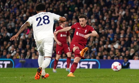 Liverpool's Diogo Jota fires in off the post.