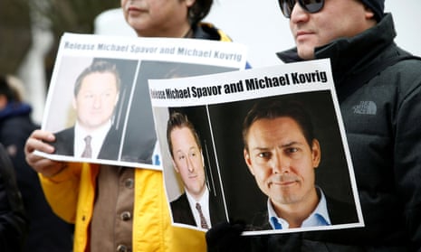 A protest against the detention of Michael Spavor and Michael Kovrig in Vancouver in 2019. Legal experts have denounced the charges against the two as baseless.