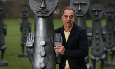 The artist Zak Ové with one of his sculptures