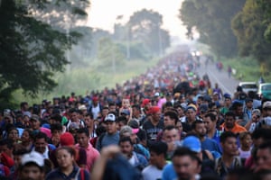 Honduran migrants take part in a caravan heading to the US on the road linking Ciudad Hidalgo and Tapachula, Chiapas state, Mexico on October 21, 2018.