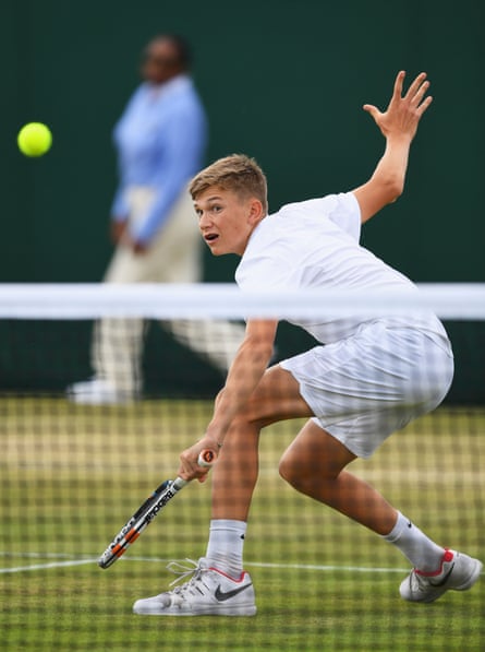 Jack Draper plays a backhand during a match at junior Wimbledon in 2018.