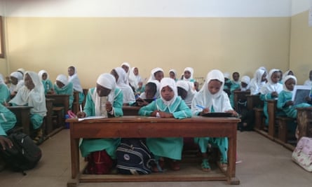 Girls take a test at the school in Yaoundé Central Mosque.