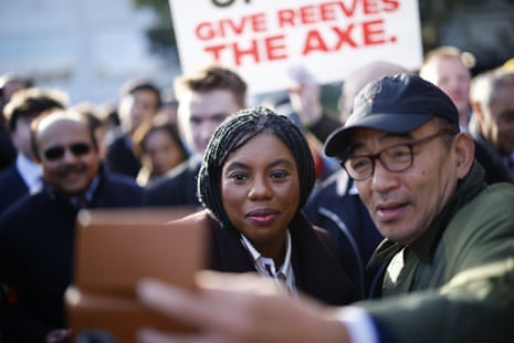 Badenoch posing for a selfie.