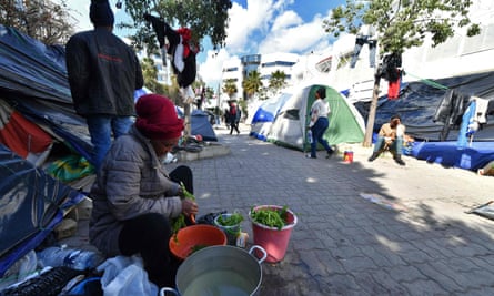 People camping outside the headquarters of the International Organisation for Migration in Tunis in March.