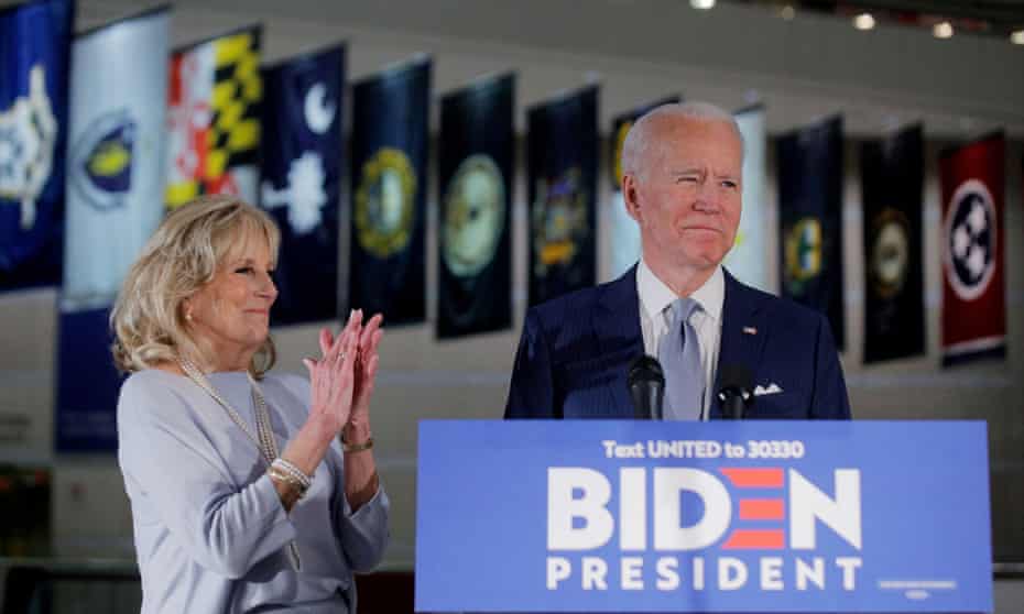 Democratic presidential candidate Joe Biden speaks with his wife Jill at his side during a primary night speech at The National Constitution Center in Philadelphia, Pennsylvania, on Tuesday night.