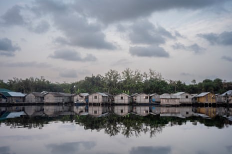 A view across the lake of Nzulezo village on stilts 