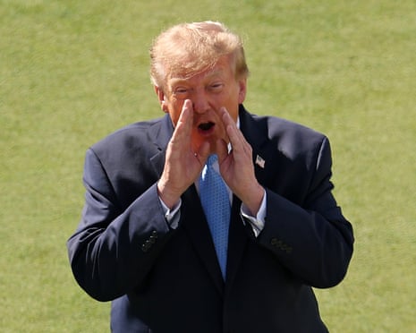 Extreme close-up of Donald Trump's face with his mouth open, squinting in sunlight