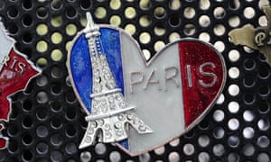 Close-up of Paris Eiffel Tower badge on a fence in Paris, France