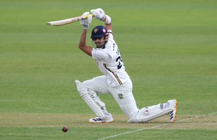 Emilio Gay cover drives to the boundary.