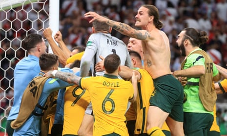Australia’s Socceroos celebrate their penalty shootout win over Peru in the intercontinental playoff to reach the 2022 World Cup in Qatar.