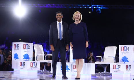 Liz Truss and Rishi Sunak posing for photos after the final hustings.