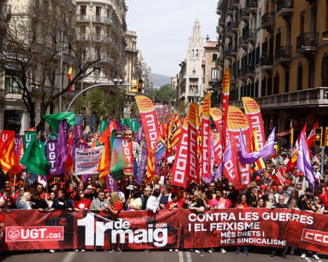 Demonstrators attend a rally to mark the International Workers' Day in Barcelona, Spain.