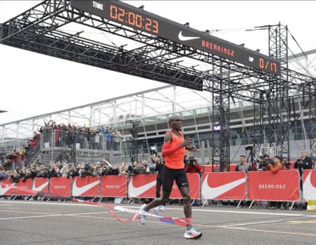 Eliud Kipchoge crosses the finish line at Monza in May 2017 after narrowly missing the two-hour barrier.