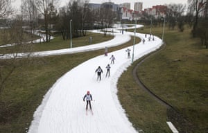 Minsk, Belarus. People skiing on an artificial track in the city's Vyasnyanka district