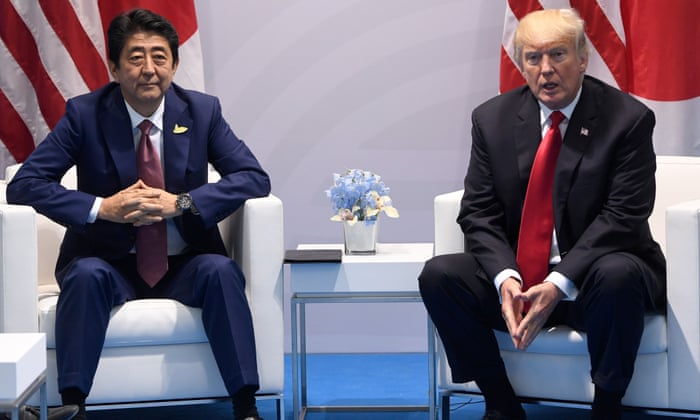 US President Donald Trump and Japanese Prime Minister Shinzo Abe hold a meeting on the sidelines of the G20 Summit in Hamburg, Germany, July 8, 2017. / AFP PHOTO / SAUL LOEBSAUL LOEB/AFP/Getty Images