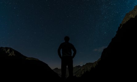 Silhouette of person gazing at the stars