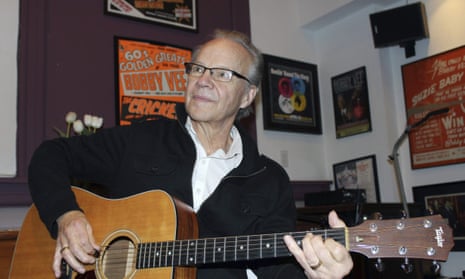 Bobby Vee plays the guitar at his family’s Rockhouse Productions in St Joseph, Minnesota in 2013.