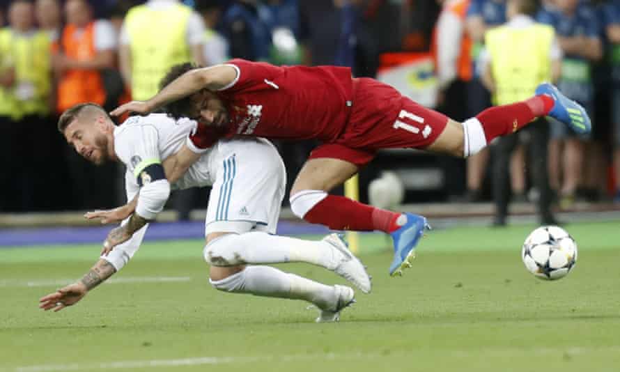 Sergio Ramos tussles with Liverpool’s Mohamed Salah in the 2018 Champions League final