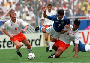 Brazil’s Bebeto is tackled by Frank Rijkaard during the first half.