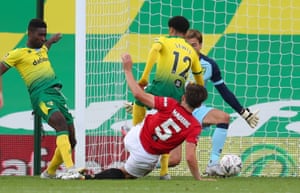 Manchester United’s Harry Maguire guides the ball home.